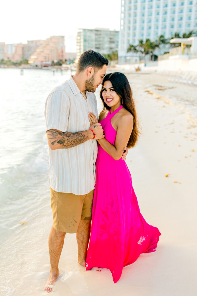 sunrise engagement session in cancun with bride in pink dress